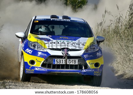 MOLLERUSSA, SAPIN - AUG 31: Spanish driver Emma Falcon and his codriver Rogelio Peate in a Ford Fiesta R2 race in the 4th Rally Pla d\'Urgell, on Aug 31, 2013 in Mollerussa, Spain.