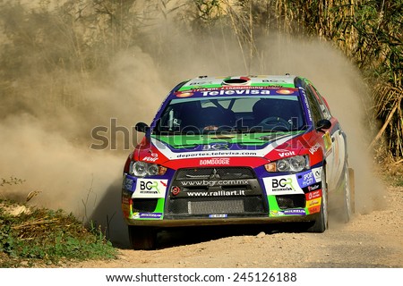 SALOU, SAPIN - OCT 25: Mexican driver Benito Guerra and his codriver Borja Rozada in a Ford Fiesta RS WRC race in the 50th Rally RACC Rally of Spain, on Oct 25, 2014 in Salou, Spain.