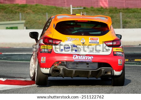 BARCELONA, SAPIN - SEP 7: Team formed by Jose M Alonso, Javier Hernandez, and Jaime Font races in a Renault Clio in the 24 Hours of Barcelona, at Catalunya Circuit, on Sep 7, 2014 in Barcelona, Spain