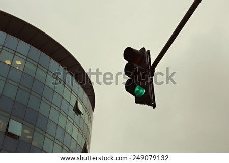 Green traffic light in the city, Traffic lights against sky backgrounds, vintage color filter