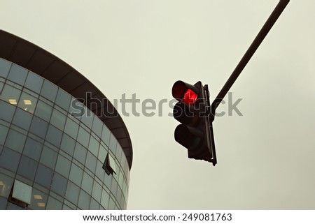 Red traffic light in the city, Traffic lights against sky backgrounds, vintage color filter