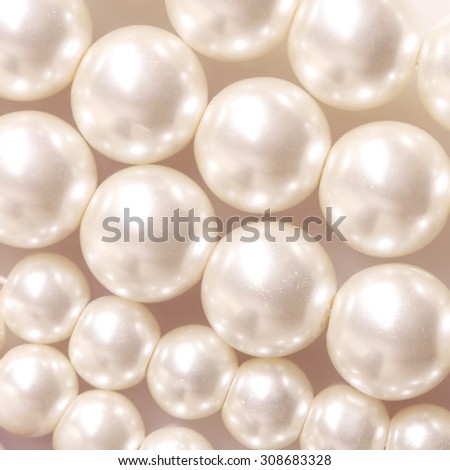 Pile of pearls on the white background
