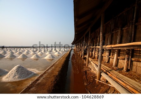 Salt collecting and a house for salt storage at Phetchaburi Province, Thailand