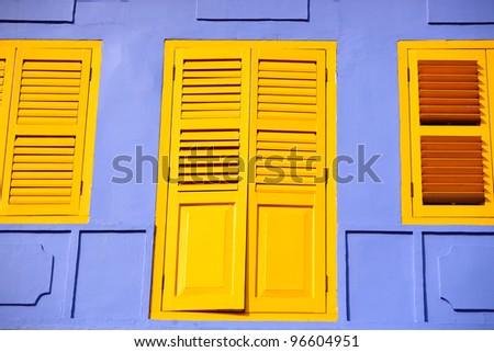 Wooden door with the purple and yellow