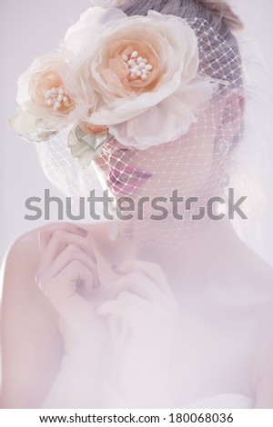 Portrait of beautiful bride. Wedding dress. Wedding decoration. Creative Make up and Hair Style. Hairstyle. Bouquet of Beautiful Flowers