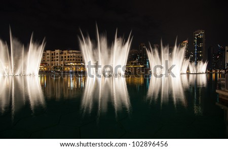 DUBAI - NOVEMBER 5: The Dubai fountain at Burj Khalifa Lake on November 5, 2011 in Dubai, United Arab Emirates. The Dubai Fountain is illuminated by 6600 lights and shoots water 240 feet into the air.