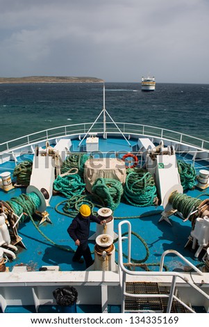 MALTA - MARCH 29: Worker on the M.V. Ta\' Pinu Gozo Channel Ferry crossing on March 29, 2013 from Malta to Gozo. The Gozo Channel company hires about 240 employees to run its ferry service.