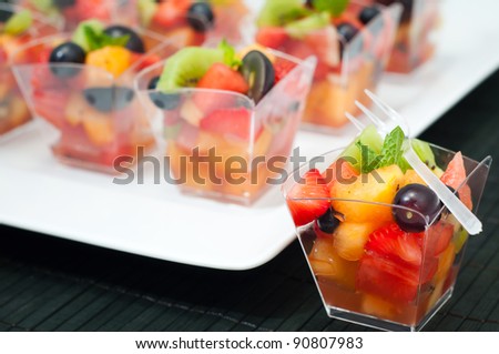 Fruit cups on a white plate