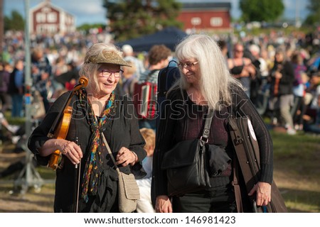 BINGSJO, SWEDEN Ã¢Â?Â? JULY 3: The traditional folk music festival on July 3, 2013 in Bingsjo. The festival is held annually on the first Wednesday in July and attracts thousands of musicians and visitors.