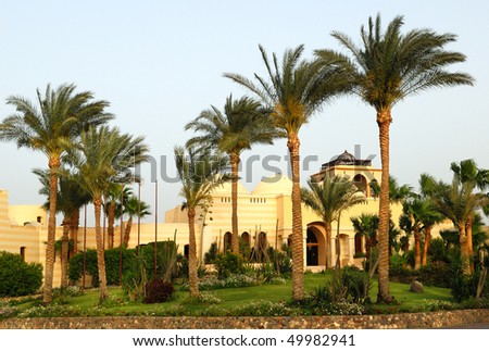 View for modern arabian style resort in evening sunset rays. Makadi-bay. Egypt