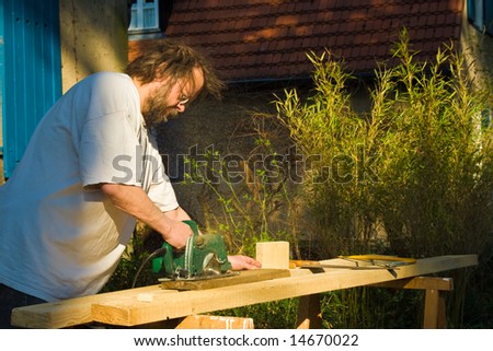 sawing timber
