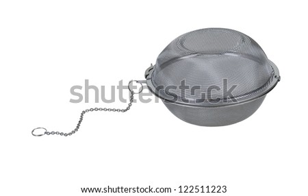 Metal tea infuser used to hold lose tea leaves when making tea - path included