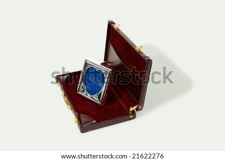 Mini silver heart frame for a small picture, leather Briefcase used to carry items to the office