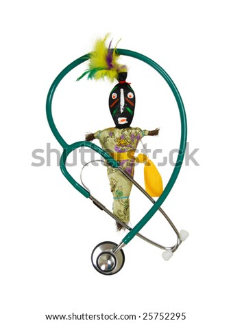 Voodoo doll representing an interesting culture of magic and suggestions of luck and destiny intertwined with a stethoscope