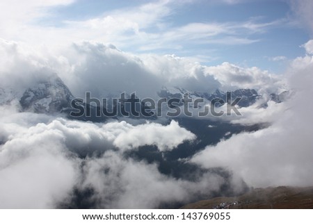 Autumn day with clouds in the mountains