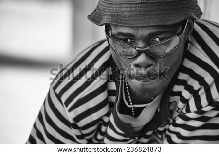 Cape Town, South Africa - circa November 2011, Unidentified man stares blankly in this close up black and white.