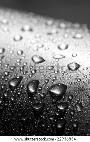 water drops on silver metal surface