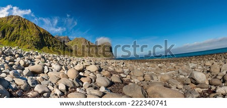 Summer panoramic view to beach and mountains at Unstad, Lofoten Norway