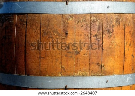 A close up of a wood barrel.