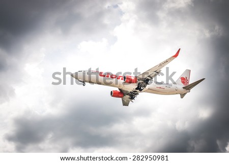 BANGKOK, THAILAND - MAY 20, 2015: HS-LTH Thai Lion Air Boeing 737-900  landing to Don Mueang International Airport Thailand. Thai Lion Air  company is the largest low cost airlines in Asia.