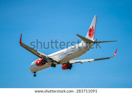 BANGKOK, THAILAND - JUNE 1, 2015: HS-LTL Thai Lion Air Boeing 737-900 landing to Don Mueang International Airport Thailand. Thai Lion Air company is the largest low cost airlines in Asia.