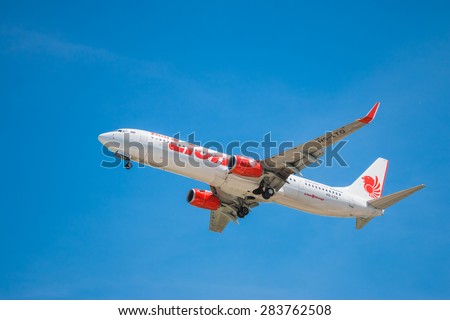BANGKOK, THAILAND - JUNE 1, 2015: HS-LTQ Thai Lion Air Boeing 737-900 landing to Don Mueang International Airport Thailand. Thai Lion Air company is the largest low cost airlines in Asia.
