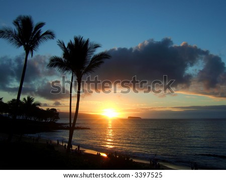 Hawaiian sunset with Molokini Crater in the distance.