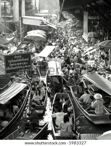 Black and white image of traditional floating market near Bangkok, Thailand.