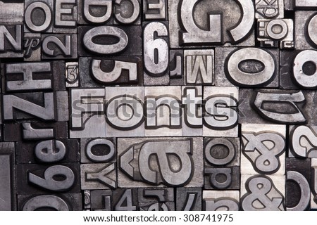 lead type letters form the word fonts