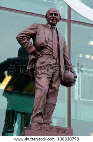 SALFORD, ENGLAND - JULY 26: A statue of Sir Matt Busby outside the East Stand, Old Trafford in England celebrating his contribution to Manchester United football club pictured on July 26, 2012.