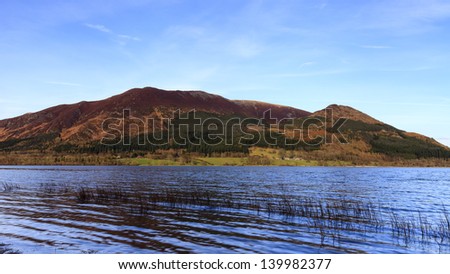 Bassenthwaite Lake View.  The view across Bassenthwaite Lake in the English Lake District National Park with Skiddaw mountain in the background.  Skiddaw is the fourth highest mountain in England.