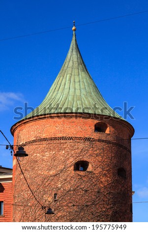 The Powder Tower.  The Powder Tower in Riga, capital of Latvia, dates back to the 14th century and was originally part of the defensive fortress surrounding the old town.