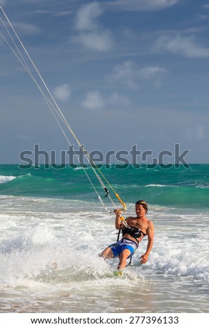 MIAMI, FLORIDA, NOVEMBER 21:  An unidentified kitesurfer surfing off Miami Beach, Florida on November 21th, 2014.