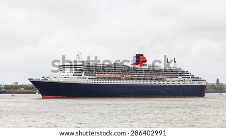 LIVERPOOL, ENGLAND - MAY 25: Cunard cruise liner Queen Mary 2 is pictured on the River Mersey on May 25, 2015 as part of celebrations to mark Cunard\'s 175th anniversary.