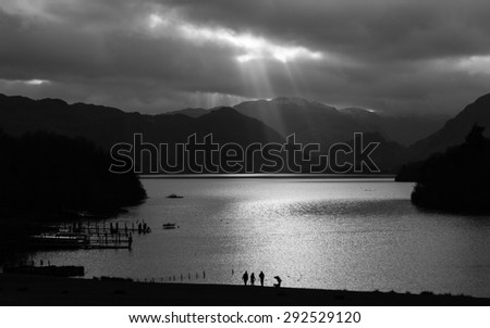 Derwentwater Sun Rays.  A high contrast black and white image of sun rays being cast over Derwentwater, Cumbria in the English Lake District National Park.