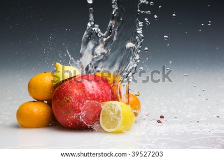 Studio shot of various fruits with water splashes