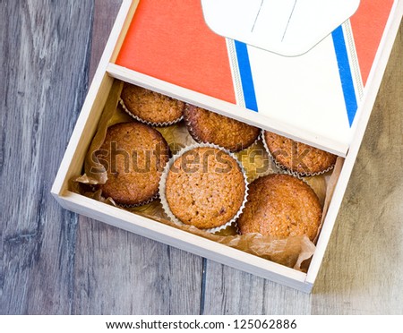 Wholewheat jam muffins in a wood box
