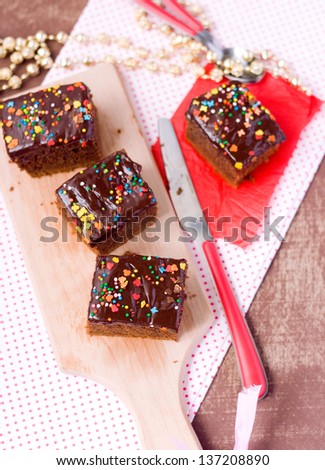 Chocolate fudge cake decorated with hundreds and thousands