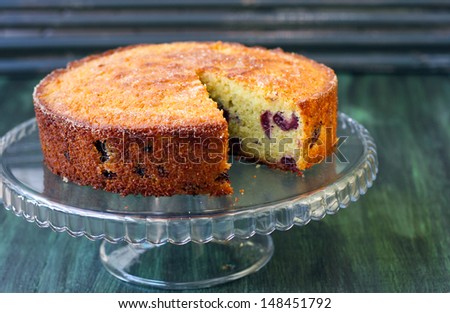 Cornmeal, almond cherry cake with orange syrup