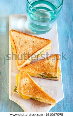 Toasted sandwiches with cheese and salad, selective focus