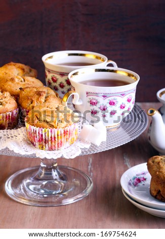 Apple muffins and tea served