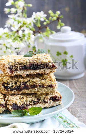 Date and oat bars on plate