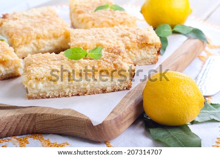 Lemon cheesecake bars on board