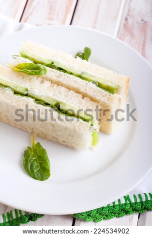 Cucumber sandwich on plate, selective focus