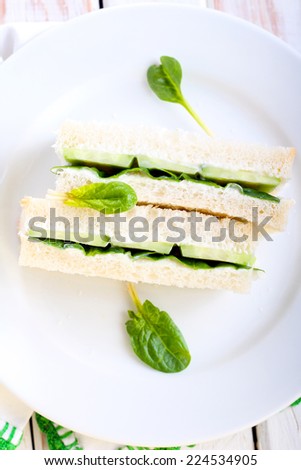 Cucumber sandwich on plate, selective focus