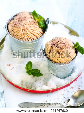 Caramel ice cream in tiny buckets