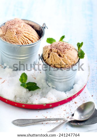Caramel ice cream in tiny buckets