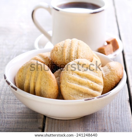Peanut butter cookies and coffee, square image