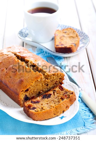 Date and coffee cake, sliced on plate