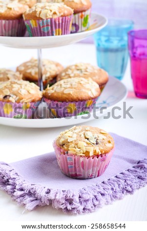 Low fat wholemeal muffins with berry and almond topping